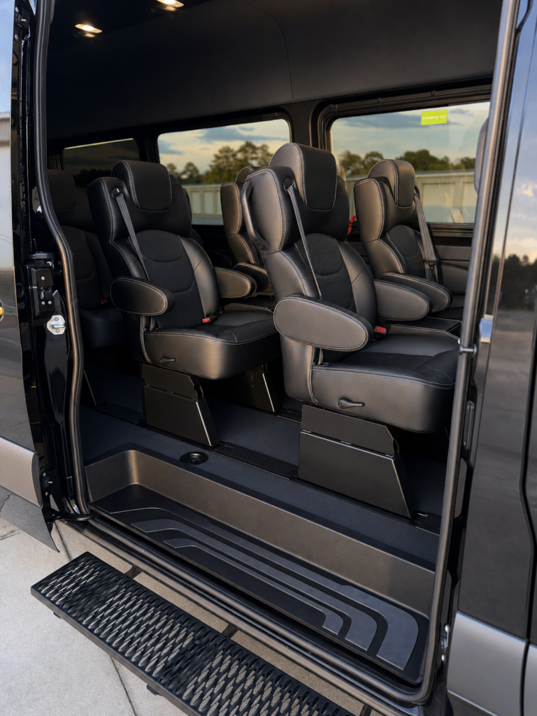 Spacious luxury Sprinter van interior with premium passenger seating