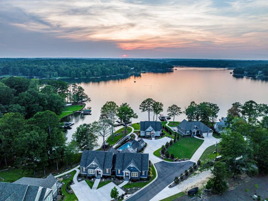 Aerial view of a lakeside residential community in Eatonton, Georgia at sunset